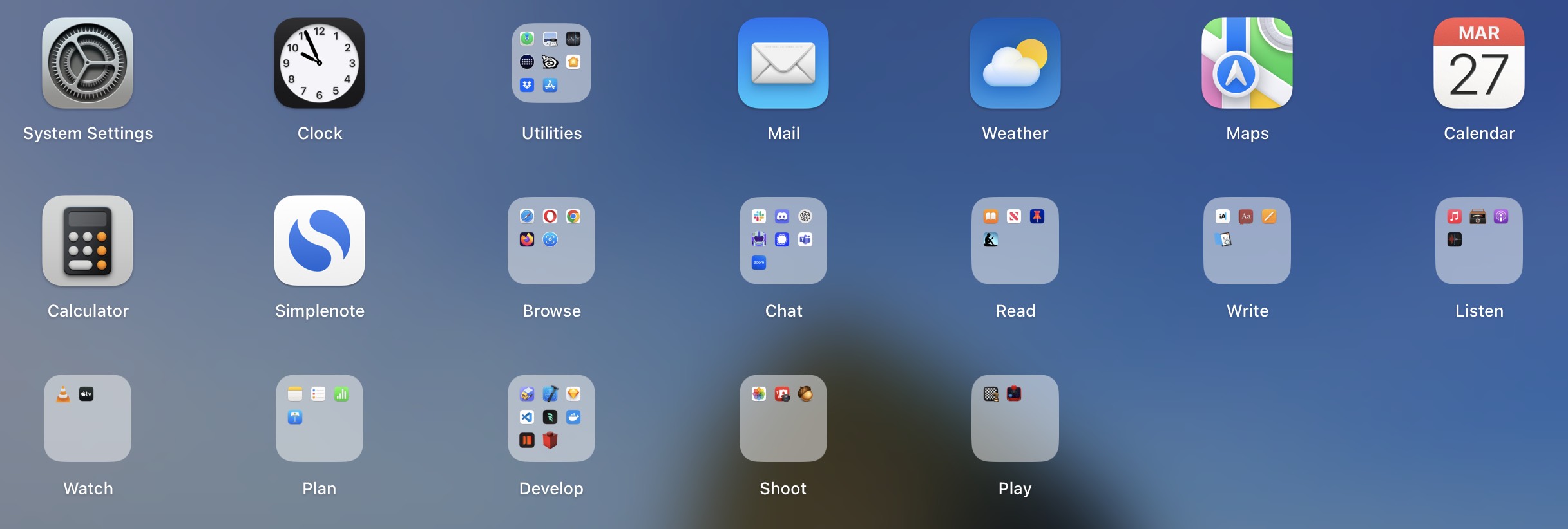A screenshot of the MacOS Launchpad app—A screenshot of the (organized) Launchpad app on MacOS.